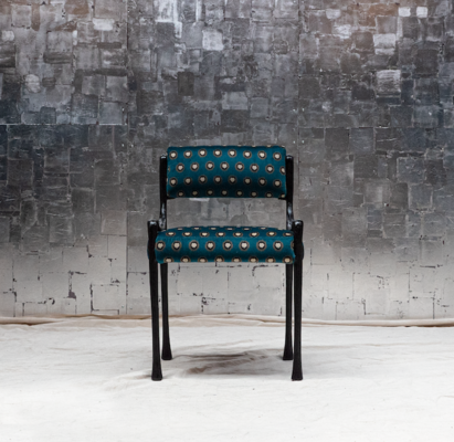 Giac side chair: The Giac collection is defined by its sinuous cast-aluminum frames and elegant forms, making its seating designs a chic option for dining scenarios